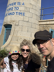 R, T, and I taking a selfie as we sit with drinks outside the Lighthouse Champagne Bar at the end of the Folkestone Harbour Arm.  It was both sunny and windy out there.