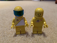 The two classic space minifig designs - 2nd wave on the left, original on the right